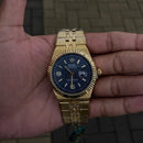 Rolex Oyster Perpetual Dourado Fundo Azul