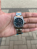Rolex Oyster Perpetual Prata Fundo Preto