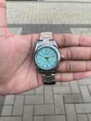 Rolex Oyster Perpetual Prata com Azul Claro