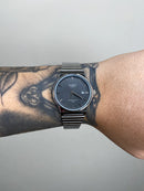 CASIO QUARTZ REDONDO PRATEADO FUNDO PRETO