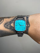 CASIO QUARTZ 2023 PRATEADO FUNDO TURQUEZA