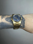 TISSOT PRX DOURADO FUNDO PRETO