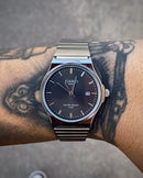 CASIO QUARTZ REDONDO PRATEADO FUNDO PRETO