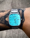 CASIO QUARTZ 2023 PRATEADO FUNDO TURQUEZA