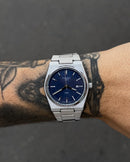 TISSOT PRX PRATEADO FUNDO AZUL